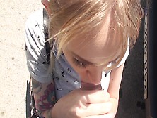 A Cute Thing Gets On Her Knees In The Street And Then She Does A Blow Job