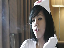 Filipino Nurse Smokes While Wearing Heels