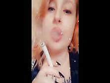 Girl With Fat Lips Smokes A Cigar