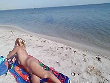 Nude Mature Blonde Tanning On The Beach