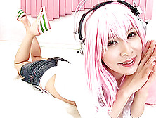 A Pink Haired Japanese Babe In A Bikini Gets Jizzed On