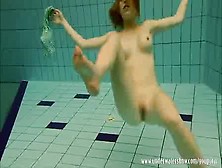 Girl Strips Swimsuit Off Under Water. Flv