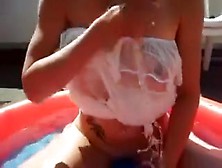 Slender White Wife With Saggy Boobs Is In The Inflatable Pool