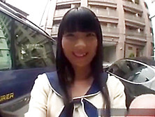 Asian Girl In A Parking Lot