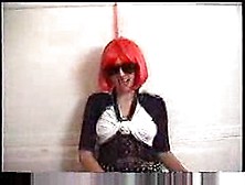 Amateur With Red Wig