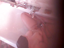 Secret Webcam Caught Her Masturbating By Water Jet In Bath