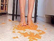 Close Up Of Trampling Food In The Kitchen By Foot Girls
