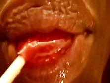Check Out Wet Glossed Soft Lips Sucking A Lollipop
