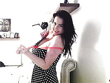 Dark Haired Lady In A Polka Dot Dress Wants To Display Her Large Breasts