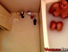Spied On Japanese Teen Babe Bathes And Fingers Hairy Pussy