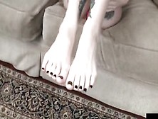 Tattooed Blonde Is Having Her Feet And Toes Sucked And Kissed