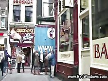 Host Takes A Tourist On A Tour Of The Red Light District