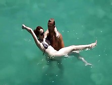 He Teaches Her How To Swim