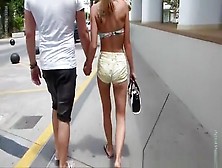 Girl In A Sexy Shorts To Walk Around The City