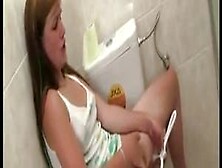 Teen Masturbating In The Toilet