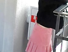 Skirt Sharking Of A Cute Japanese Chick Talking On A Phone