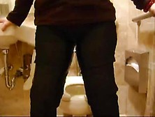 Pissing Herself In A Public Toilet