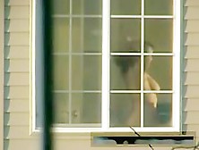 Brunette From The Opposite Window Gets Fully Naked