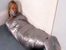 Blonde Girl Wrapped Up Mummification