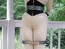 Rubber Doll Jewell In Tight Corset And White Catsuit