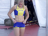 Hot Blonde Pole Vaulter Competes At A Packed Stadium