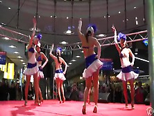 Sexy Girls In Short Skirts Dancing For The Crowd