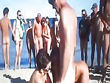 Girls Entertain Gents On The Beach