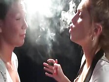 Cigar Mistress Tortures Lesbian With Her Smoke