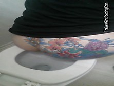 Tattooed Babe Pooping In Toilet