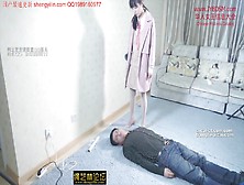 Chinese Mistress Tramples Her Slave All Over His Body And Neck