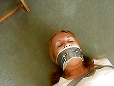 Secratary Wrapped Tied And Taped Gagged