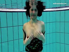 Teen In Yellow Pantyhose Goes For A Swim