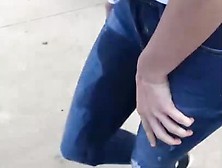 Wetting Her Jeans In A Parking Lot