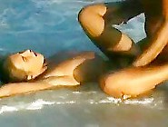 Brunette In An Anal Fuck On The Beach