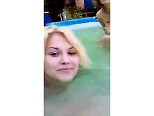 Two Girls Swimming Topless Together In Pool