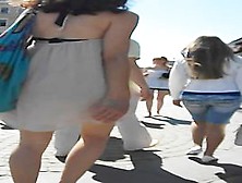 Skinny Hottie In Short White Dress Reveals Her Cunt On Spy Cam