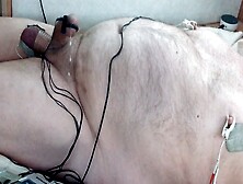 Hands Free Cumshot.  Bound And Stretched Balls Are Swollen And Shocked With Estim Along With Nipples And Cock