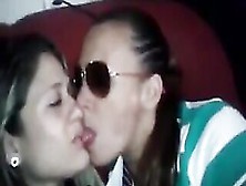 Two Shy Girls Kissing