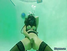 Scuba Diving Tart Playing With Her Shaved Cunt