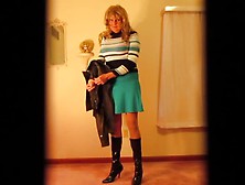 Crossdresser In Leather Coat And Teal Skirt