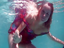 Hot Redhead Baby Nikita Vodorezova Gets Naked Underwater