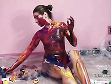 Covering Her Slim Form In Food Coloring,  This Foreign Whore Smile,  Painting Herself