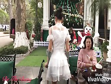 Vietnamese Girl Show Us Christmas Tree In Hanoi