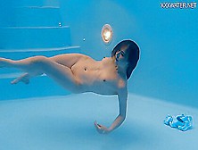 Petite Russian Marfa Swims Nude In The Pool