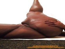 Large Ebony Woman Masturbates