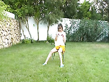 Ivana Teen Getting Wet On The Garden