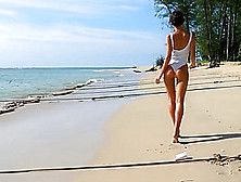 Sexy College Girl On Beach Teasing With Her Ass In One Piece Bikini
