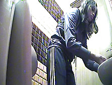 Chick In Sporty Pants Spycam Pissing