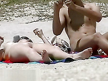 A Couple Of Shameless Nudists On The Beach