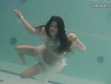 Young Brunette Swims In Sheer White Clothes